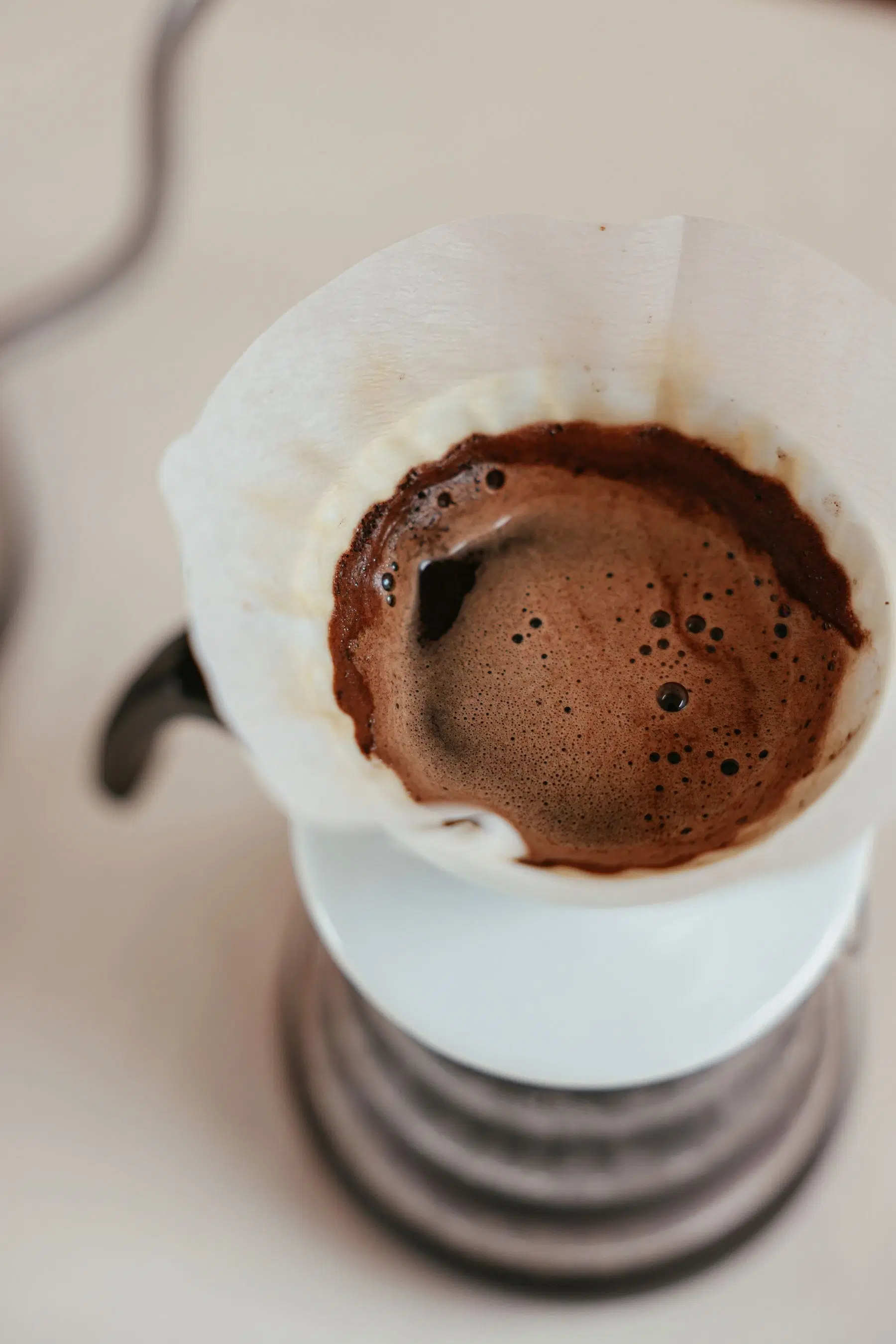Coffee blooming in a pour-over dripper
